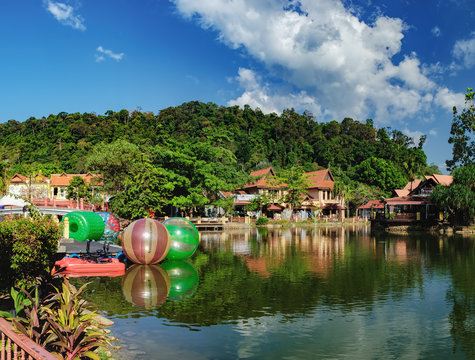 Oriental Village gateway to ride a cable-car up Mat Cingcang mountain. Luxury Paradise by the lake, restaurants, spa home, hotels and shops for tourists