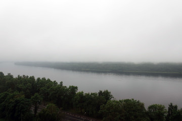 Fototapeta na wymiar A river in the fog