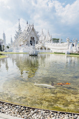 Fototapeta na wymiar Wat Rong Khun (White Temple) - art exhibit in the style of a Buddhist temple in Chiang Rai Province, Thailand