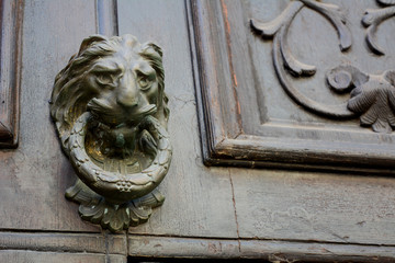 ancient clapper on an ancient door