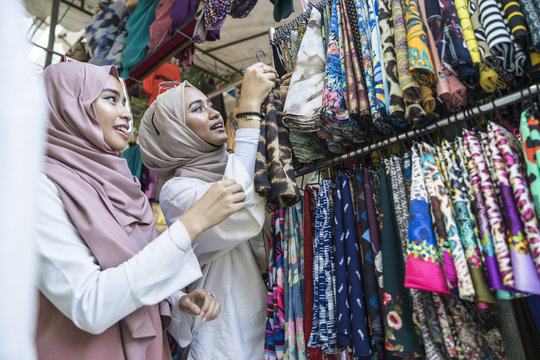 Two muslim ladies shopping for hijab
