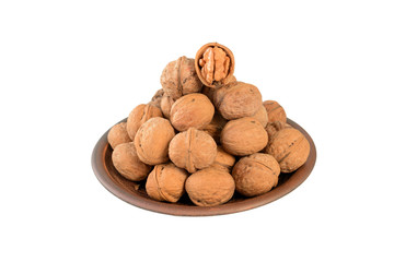 Walnut kernel halfs in a wooden bowl