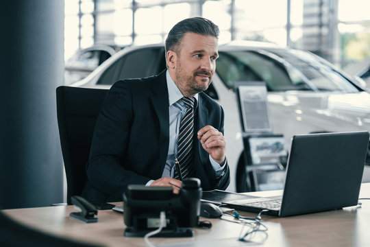 Top Sales Manager At Dealership Showroom