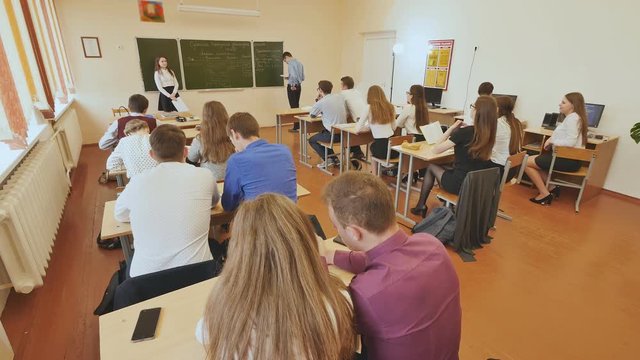 Students in the classroom are at their desks. Russian school.