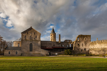 Obraz premium Ruins of old Bishop castle in Haapsalu. Summer autumn day, view from the yard.