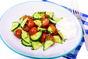 Healthy eating. Light dietary salad of fresh cucumbers and tomatoes