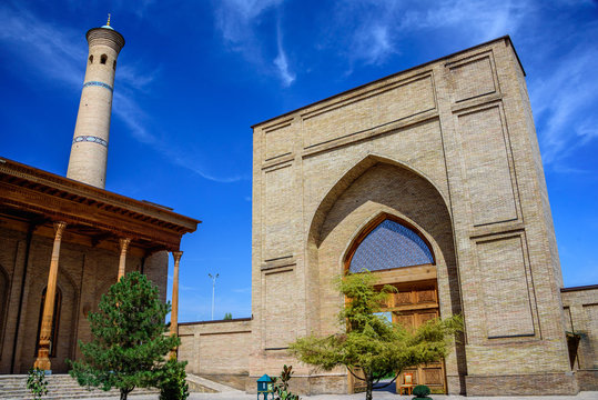 Mosque with carved columns of sandalwood, minaret and entrance of Hazrat Imam Ensemble in the center of Tashkent city, Uzbekistan