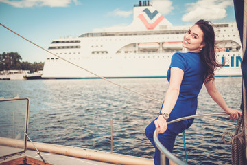 Naklejka premium Woman enjoying ride on a yacht