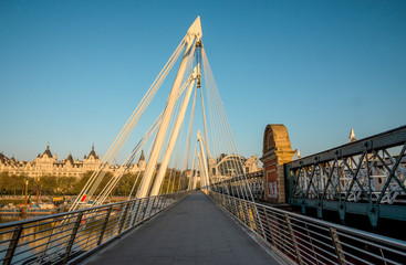 Golden Jubilee and Hungerford Bridges in London early in the morning