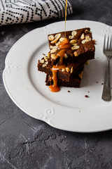 Brownies with caramel and peanuts.