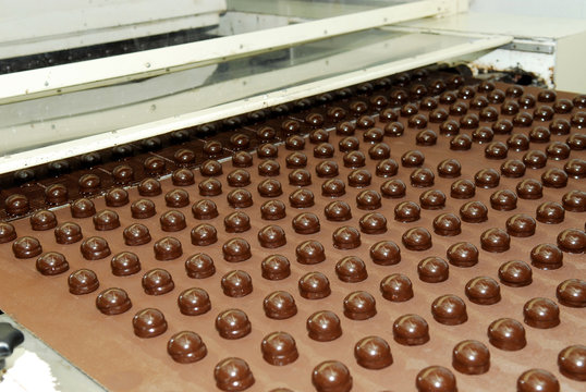 Production of chocolates, factory conveyor