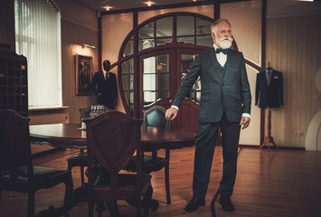 Senior client in a tailor's workshop office