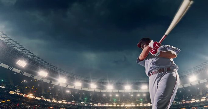 Baseball batter hitting ball during game
