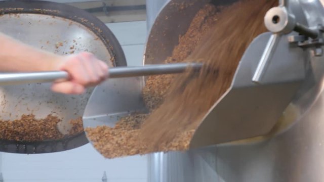 Pulling Grain from Boiler