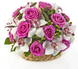 bouquet of pink roses  and lilias in basket  on white background