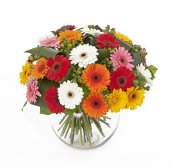 bouquet of colored gerberas in vase isolated on white background