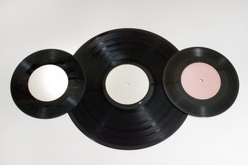 Vinyl records of different sizes