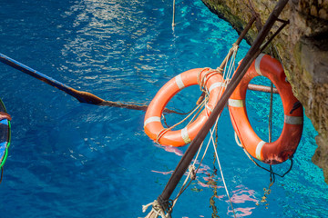 Orange rescue wheel - boat, ferry, lifebuoy