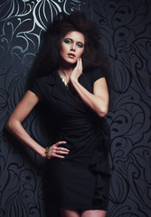 Naklejka premium Beautiful young woman with magnificent hairdo
