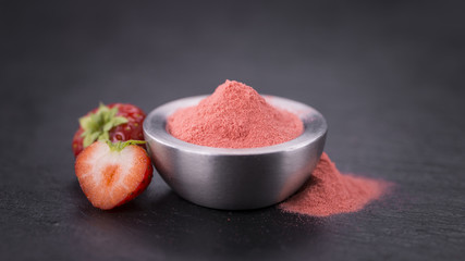 Portion of Strawberry powder on a slate slab