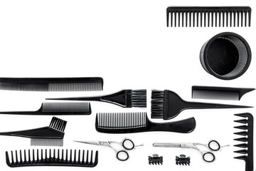 combs and hairdresser tools on white work desk background top view mockup