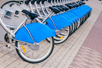 Parked Urban Bicycles on Rental Station.