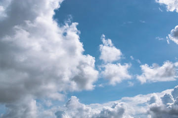 Clouds are divided into layers in the evening with light.