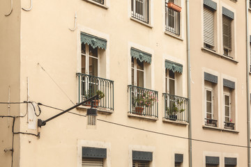 Fototapeta na wymiar Typical building facade in the center of Grenoble, France