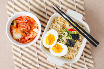 Instant noodles and kimchi cabbage with chopsticks ,Korean food