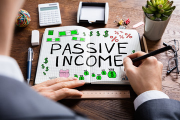 Man Drawing Passive Income Concept