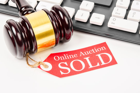 Online auction sold concept.