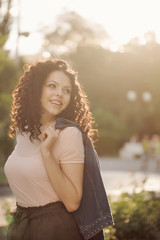 Girl teenager with curly hair