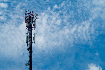 Broadcast pole with blue sky