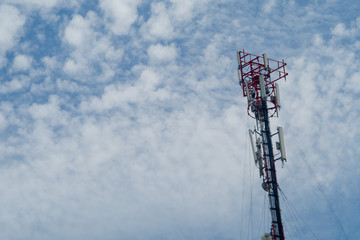 Broadcast pole with blue sky