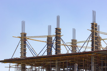 Building construction site against blue sky
