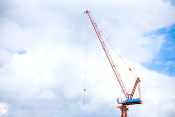 industrail crane on cloud and blue sky
