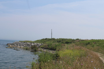 Sign post on the rock pier