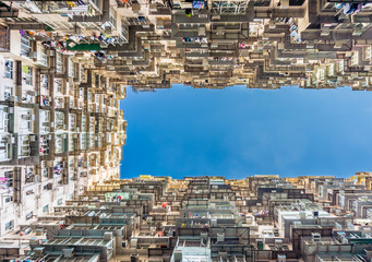 Bottom up view of Yick Cheong Building. It is located east of Hong Kong's Central Business District, on Hong Kong Island.