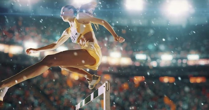 Track and field female runner hurdles on sports arena