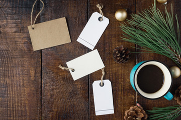 Christmas background with price tag, cup of coffee, Christmas decorations