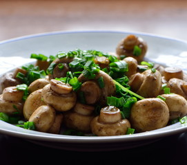 Fresh fried mushrooms with green onion