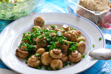 Fresh fried mushrooms with green onion