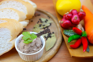 Fresh homemade chicken liver pate on bread 
