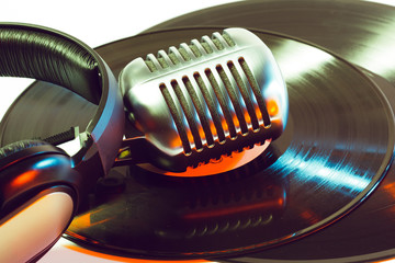 Fototapeta na wymiar microphone and segment of vinyl record