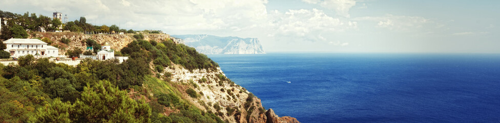 landscape panorama of a coast with blue sky