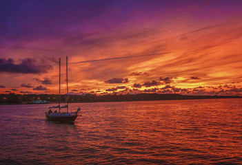 Fototapeta premium very beautiful colors in the evening sunlight shines on the ships in port