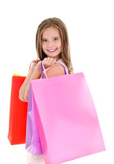 Adorable little girl child holding shopping colorful paper bags