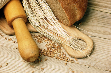 rye bread, and corn on a wooden table