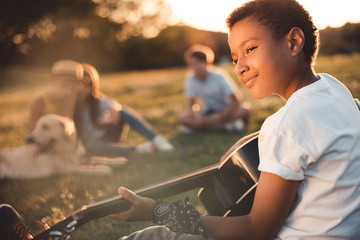 african american boy with guitar