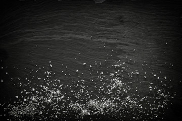 Image of sea salt on slate stone plate © tomertu